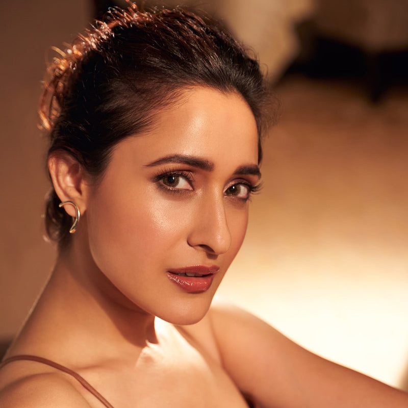 Pragya Jaiswal in Halfway Heart Stud Earrings