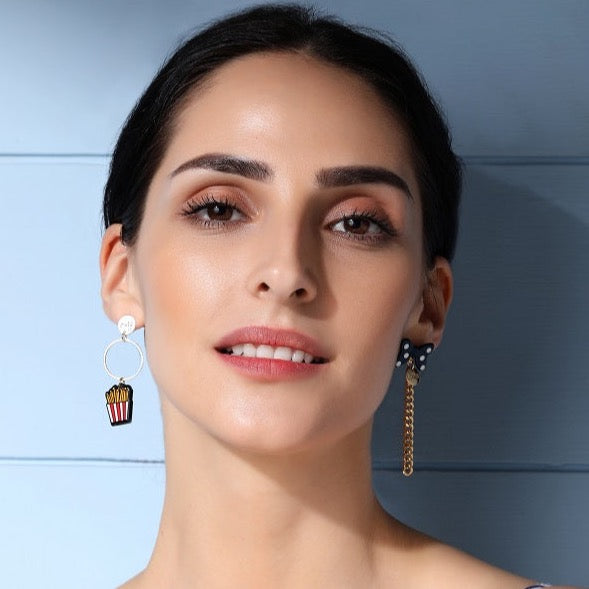 Pretty Polka Mismatch Earrings by FASHKA, front look on a model.