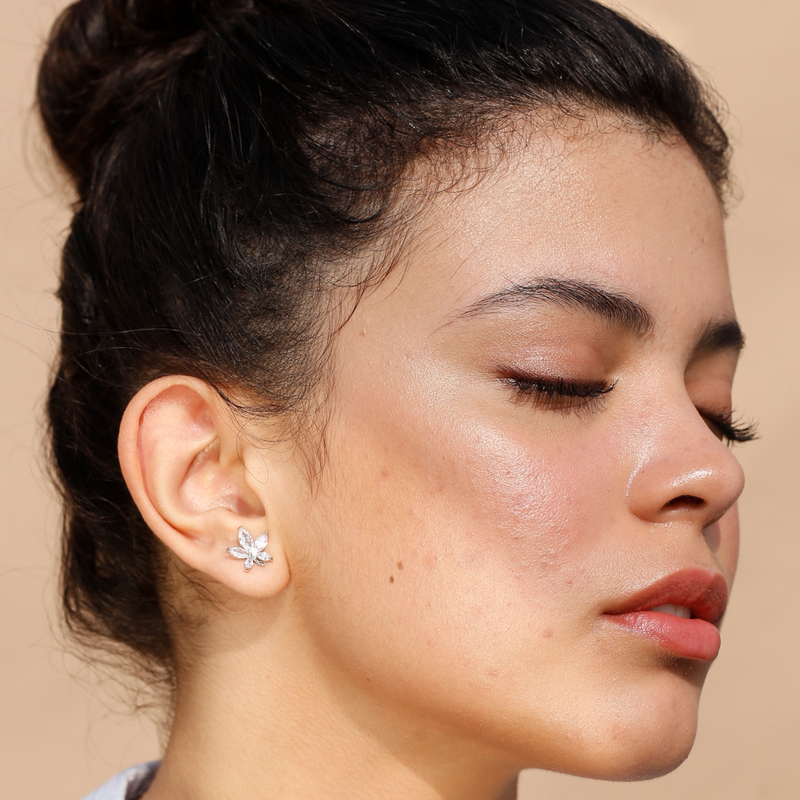Ethereal Flower Stud Earrings by FASHKA, model  right pose. 