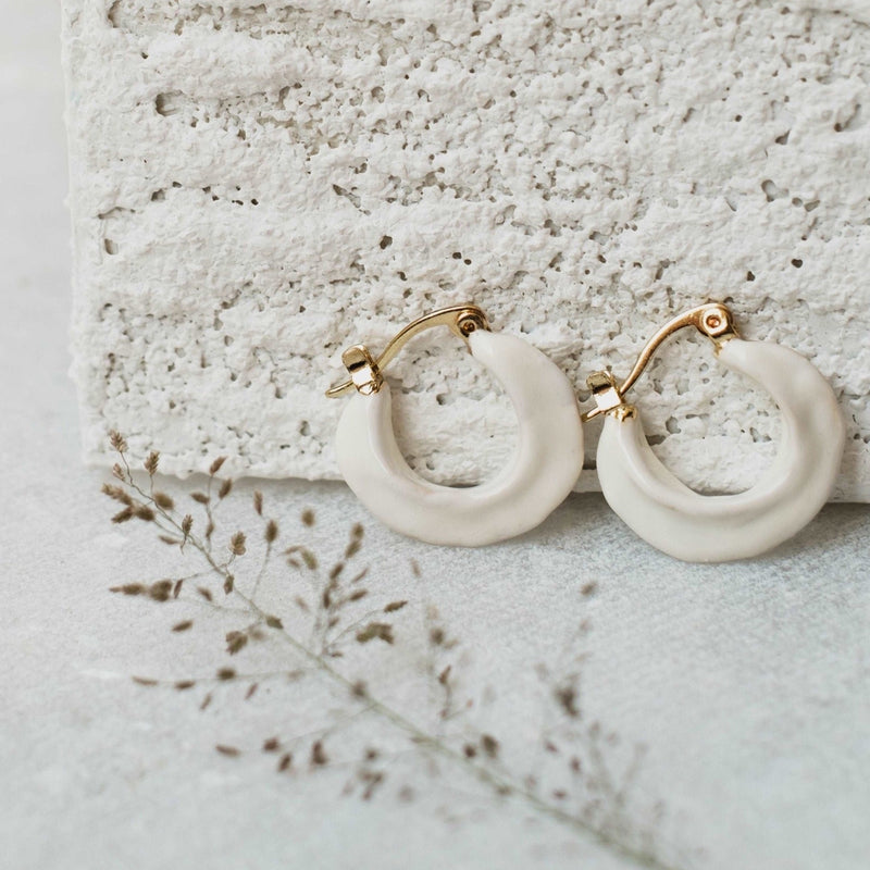 White Hoop Stud Earrings by FASHKA